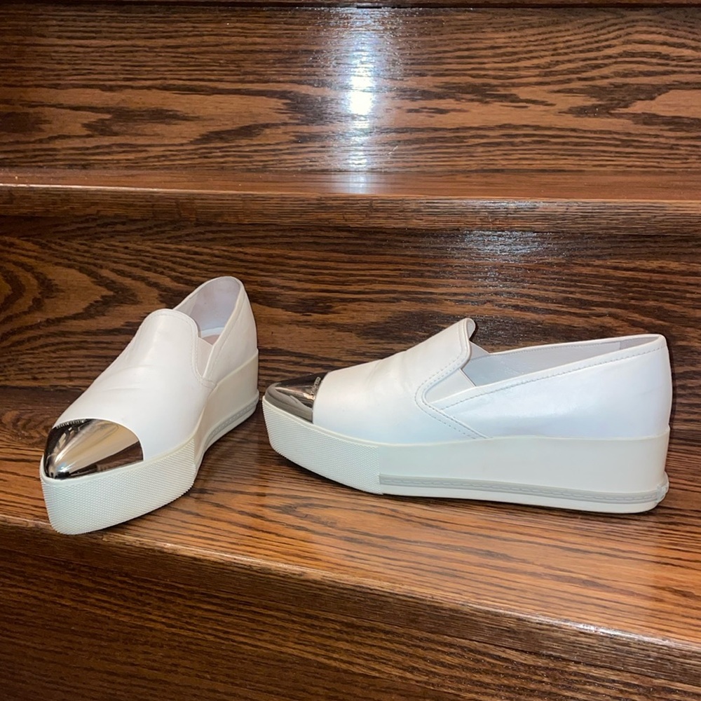 Miu Miu Black Leather Metal Cap-Toe Slip-On Sneakers white